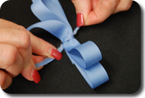 How to Tie a Bow With Ribbon Dior Style Step 2